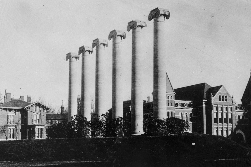 A black and white photo of the MU columns. 