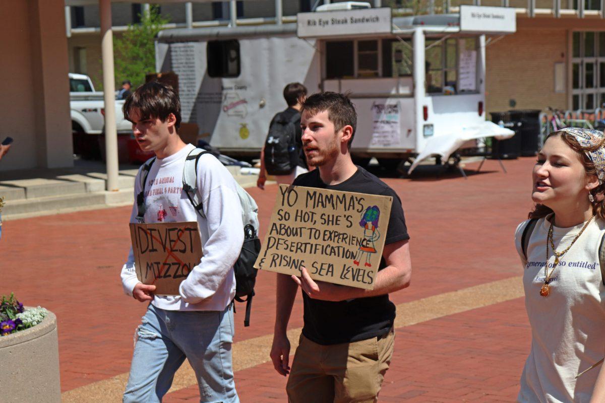 Twoprotestorswalking 2
