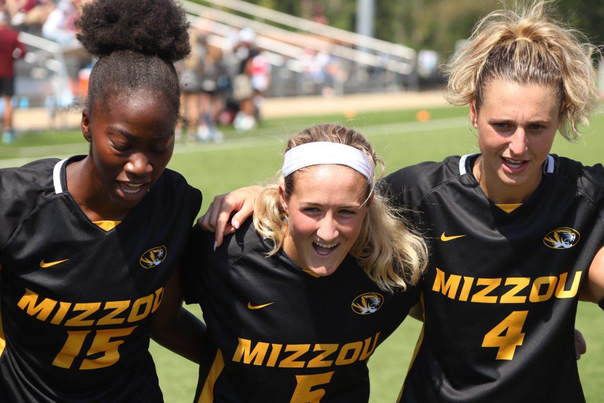 Missouri soccer team huddles before the match.
