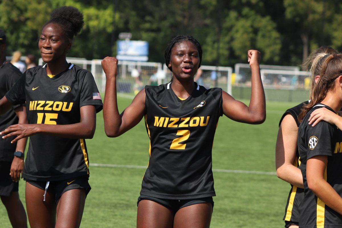 Soccer player celebrating after a win.