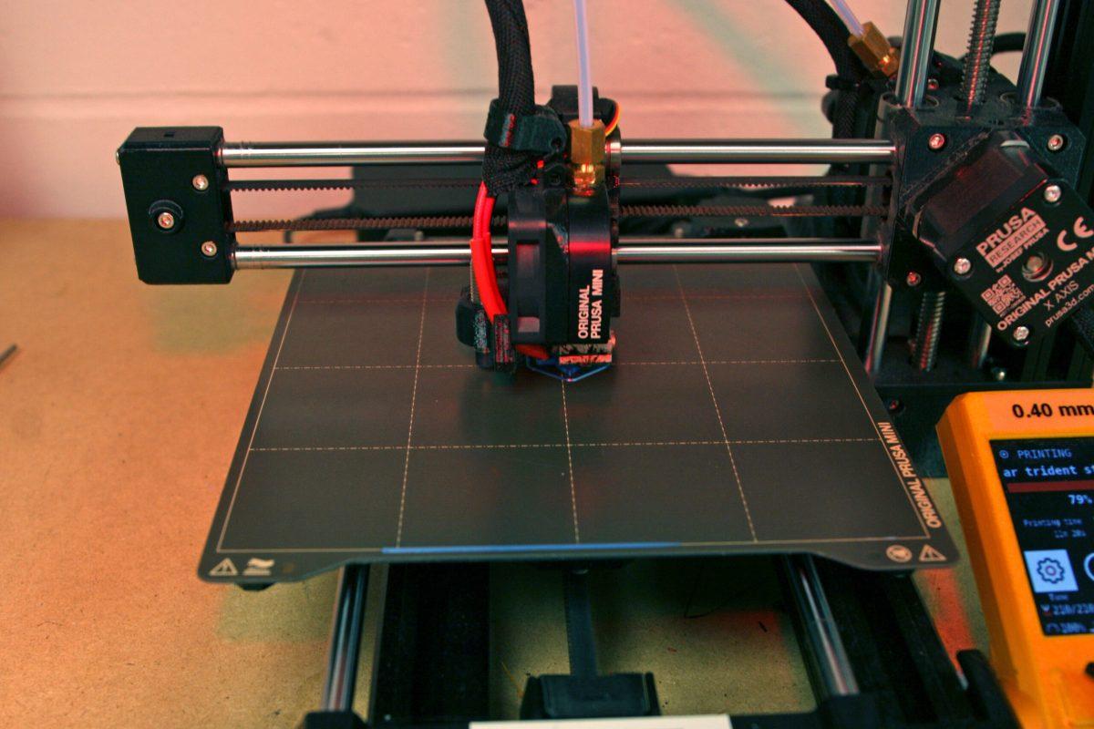 A 3D printer in the process of printing a design in the 3D printing lab of Lafferre Hall. 