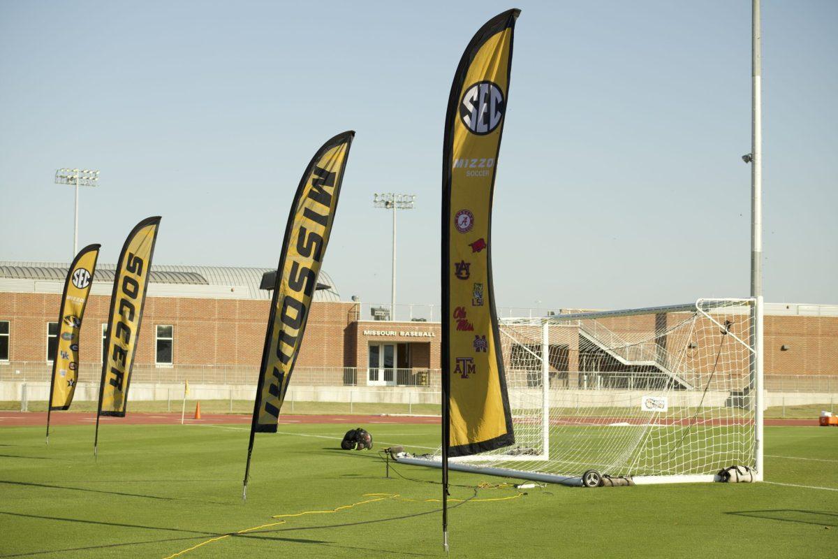 Banners waving in the wind at the stadium.