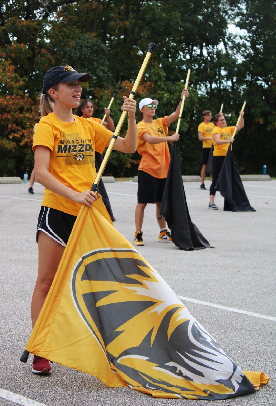 Alyssa Lingle practices her tosses for Marching Mizzou’s halftime show at the Marching Band Practice Field.
