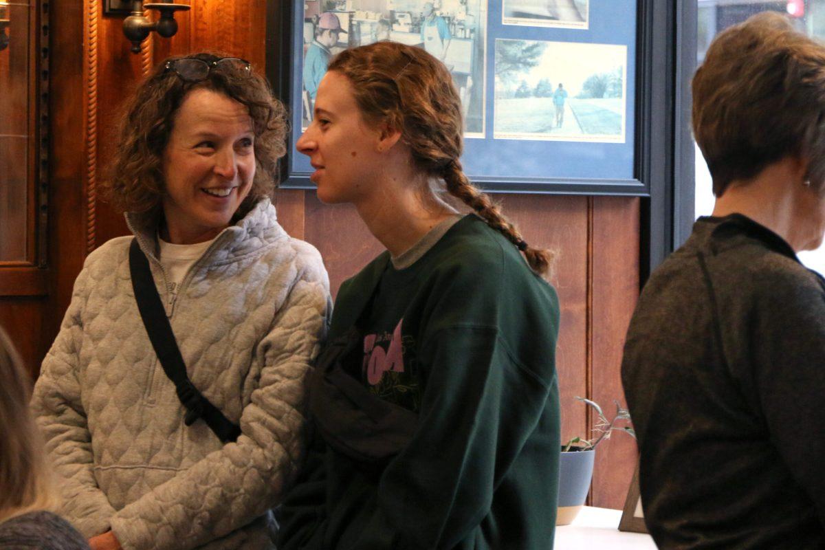 Dana Johnson, left, laughs while looking toward her daughter, Jacey Johnson, right.
