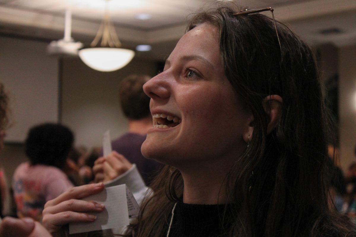  A woman fills the picture as she talks to someone not pictured.