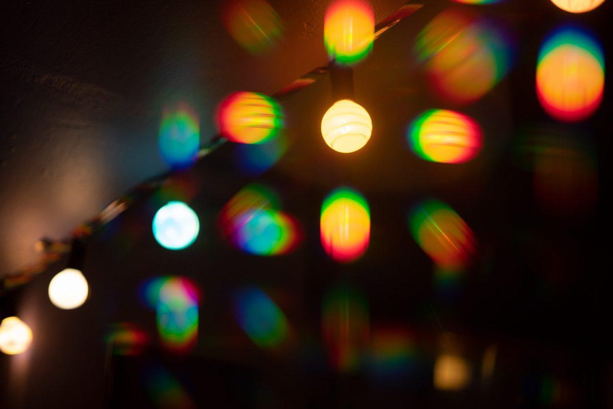 Light splits into component colors when put through a diffraction lens
