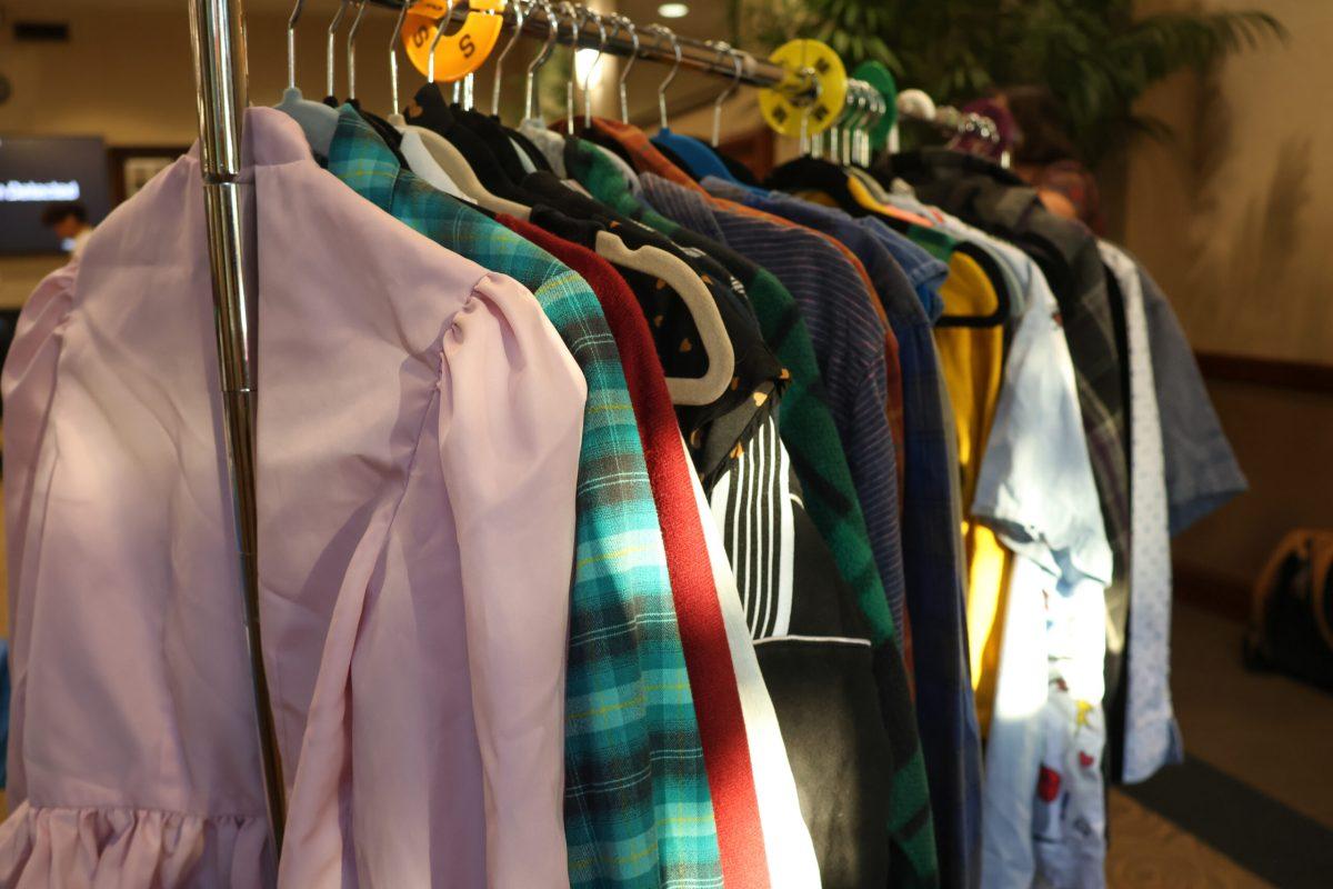 A rack of clothes standing in Memorial Union.