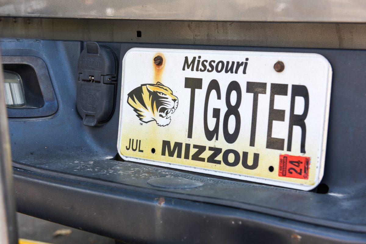 A license plate on a truck that says “TG8TER”
