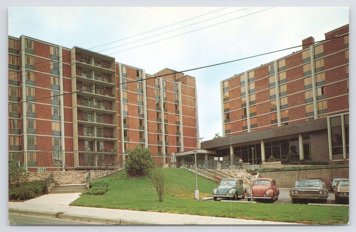 A Postcard of cars parked outside Lewis & Clark Hall soon after its completion and a photo of the outside of Lewis & Clark today.