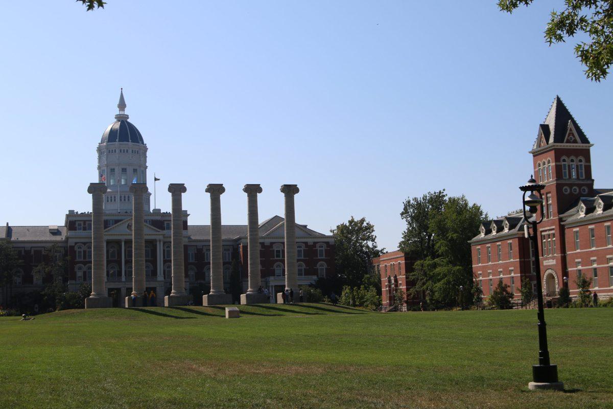A side by side comparison of a real photo postcard from the early 1900’s of The Quad and a photo of what The Quad looks like today in 2023.