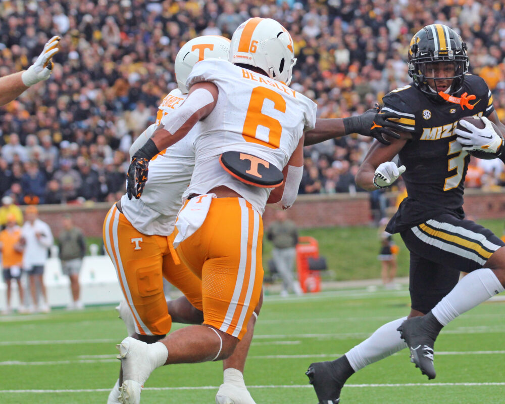 Schrader makes FBS history as Tigers route Tennessee at home