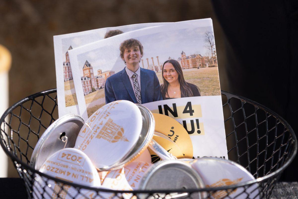 A basket of buttons promoting All in 4 Mizzou’s campaign.
