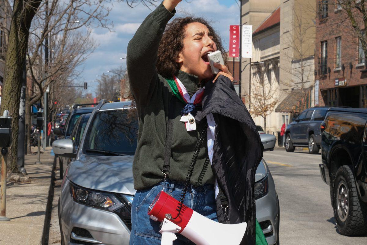 A woman hands a trumpet with facial agitation.