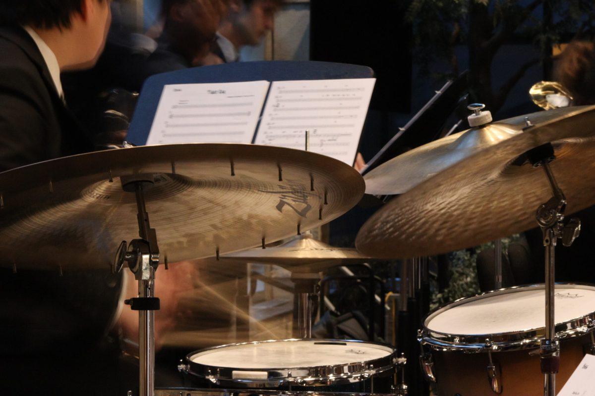 Drummer plays the snare during a song.
