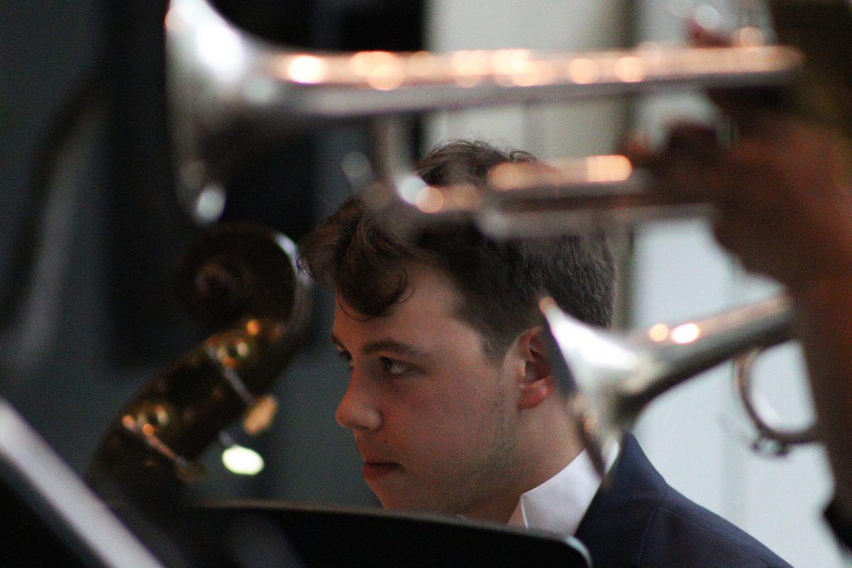 Drummer looks toward director