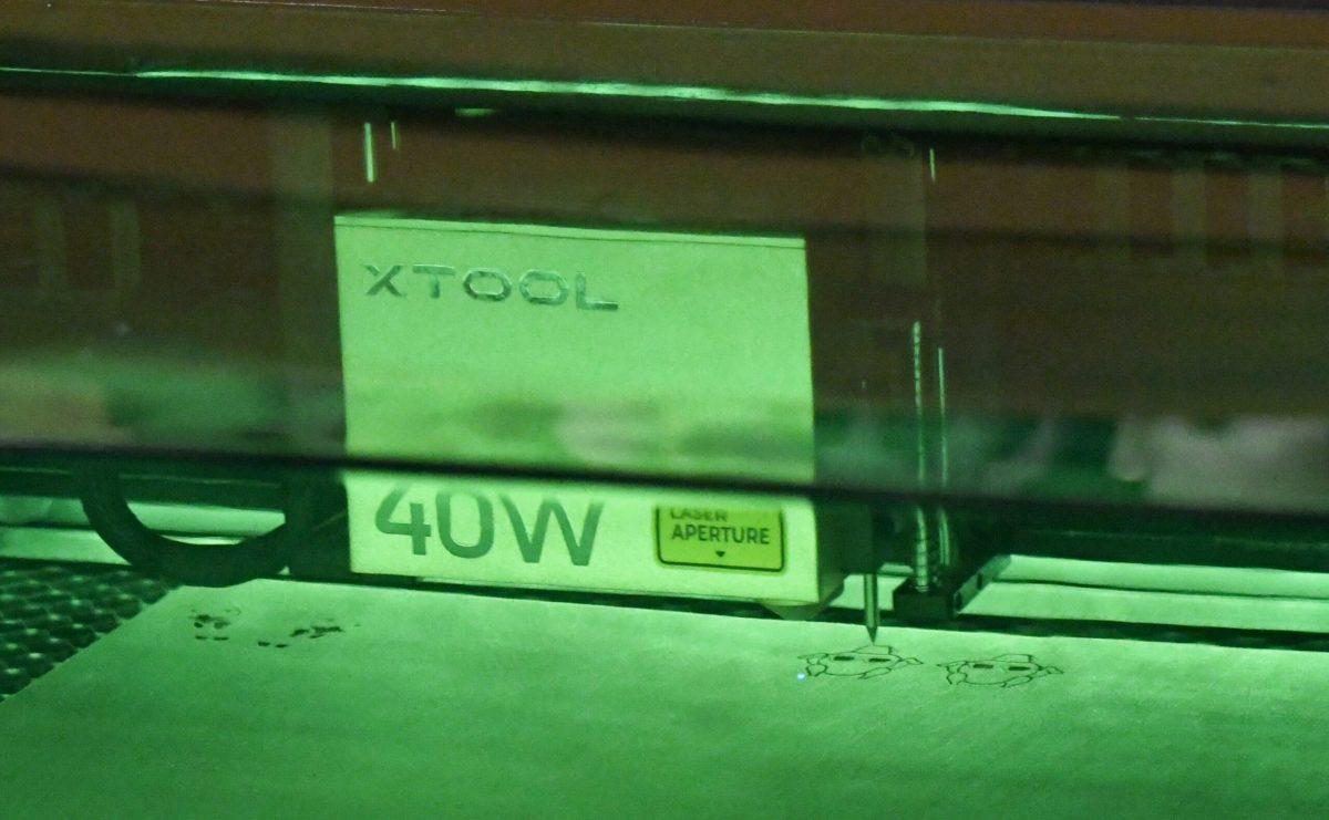 An xTool laser engraving wood.