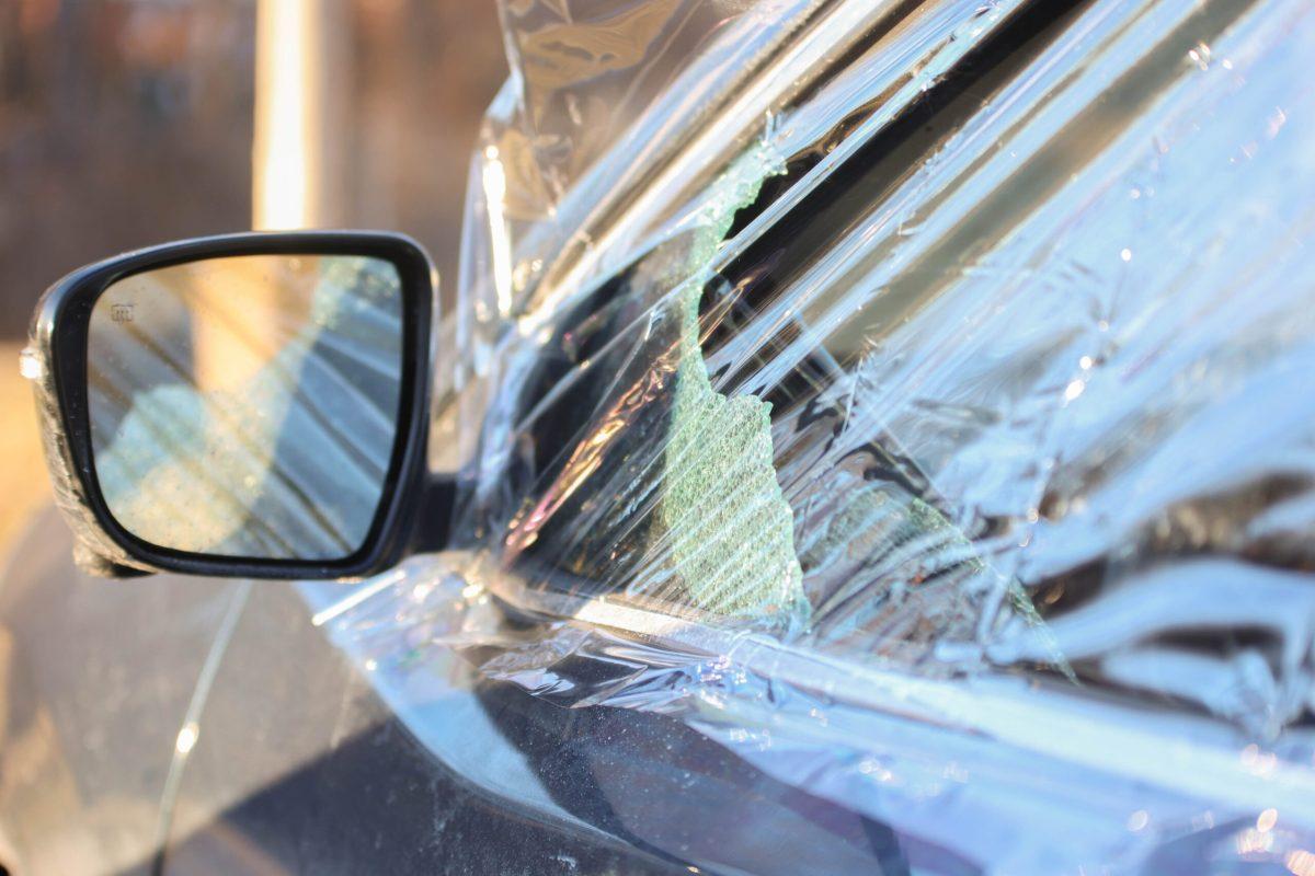 A car with a smashed window.