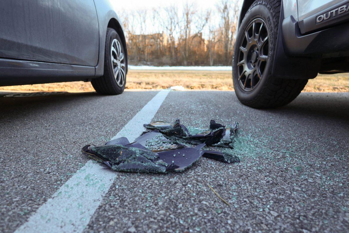 Broken glass lying on the ground.