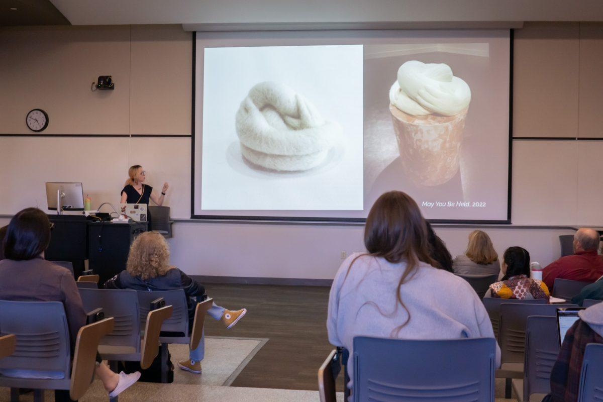 A speaker presenting to an audience.