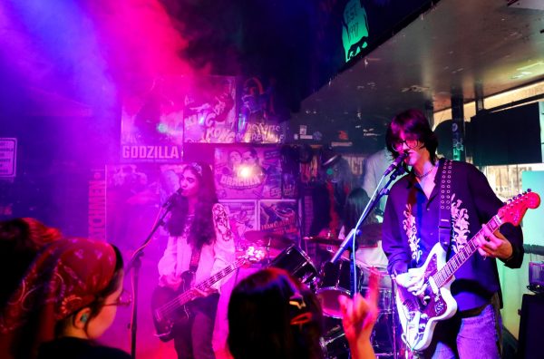 A band performs on stage.