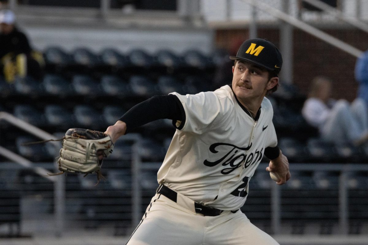 A baseball pitcher throwing a ball.