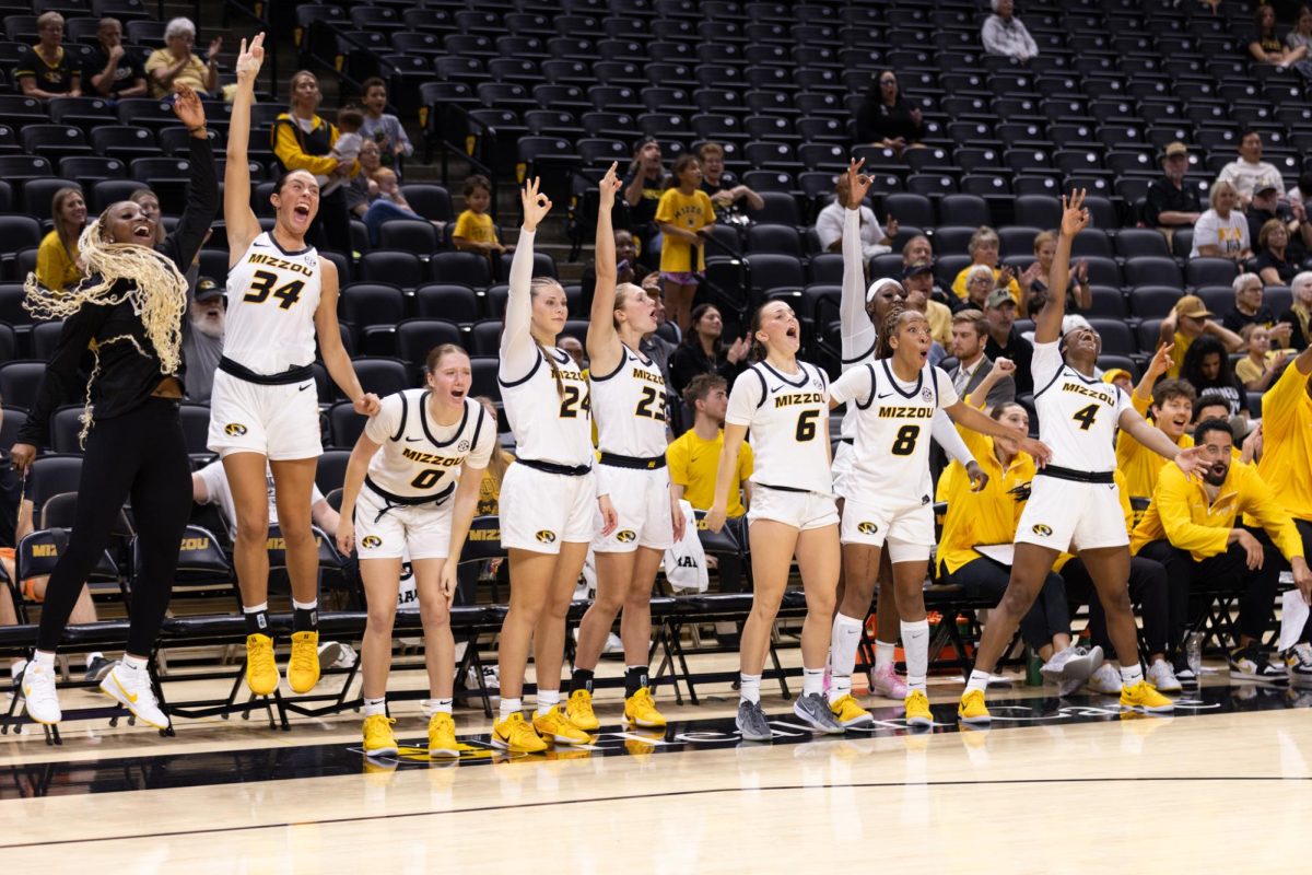 Players on the Missouri bench stand up and cheer after their teammate made a 3-point shot during the Tigers’ exhibition game against Truman State on Tuesday, Oct. 29, 2024, at Mizzou Arena in Columbia, Mo.