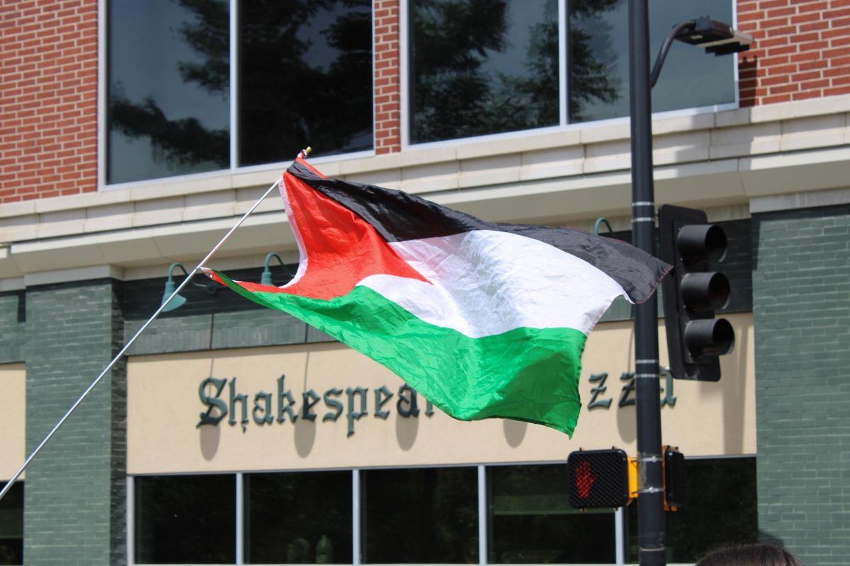  A Palestinian flag flies during an MSJP protest on the corner of S 9th St. and Elm St on Wednesday, August 27, 2025. in Columbia, Mo. MSJP holds frequent marches through downtown Columbia demanding an end to Israeli violence in Palestine. 