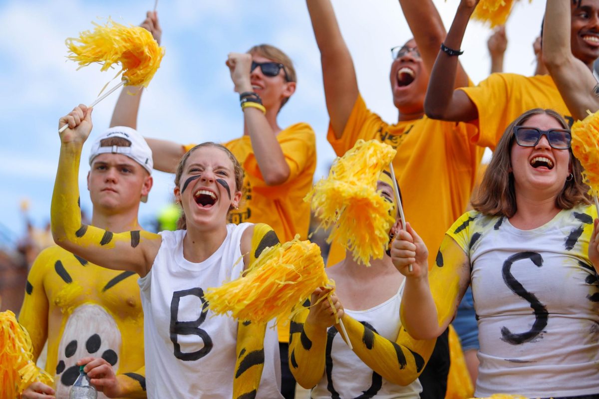 First Year Student Hannah Button cheers with friends in the student section during the game against Boston College on Saturday, Sept. 14, 2024 at Faurot Field in Columbia, Mo.