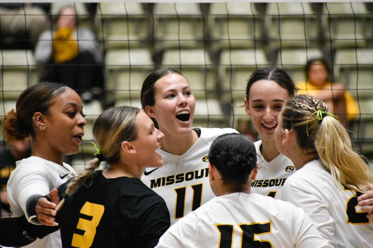 Missouri junior middle blocker Regan Haith  cheers as the team comes in for a huddle after scoring on Wednesday, Oct. 9, 2024 at the Hearnes Center in Columbia. Haith finished the game with a season-best 10 kills and two blocks.
