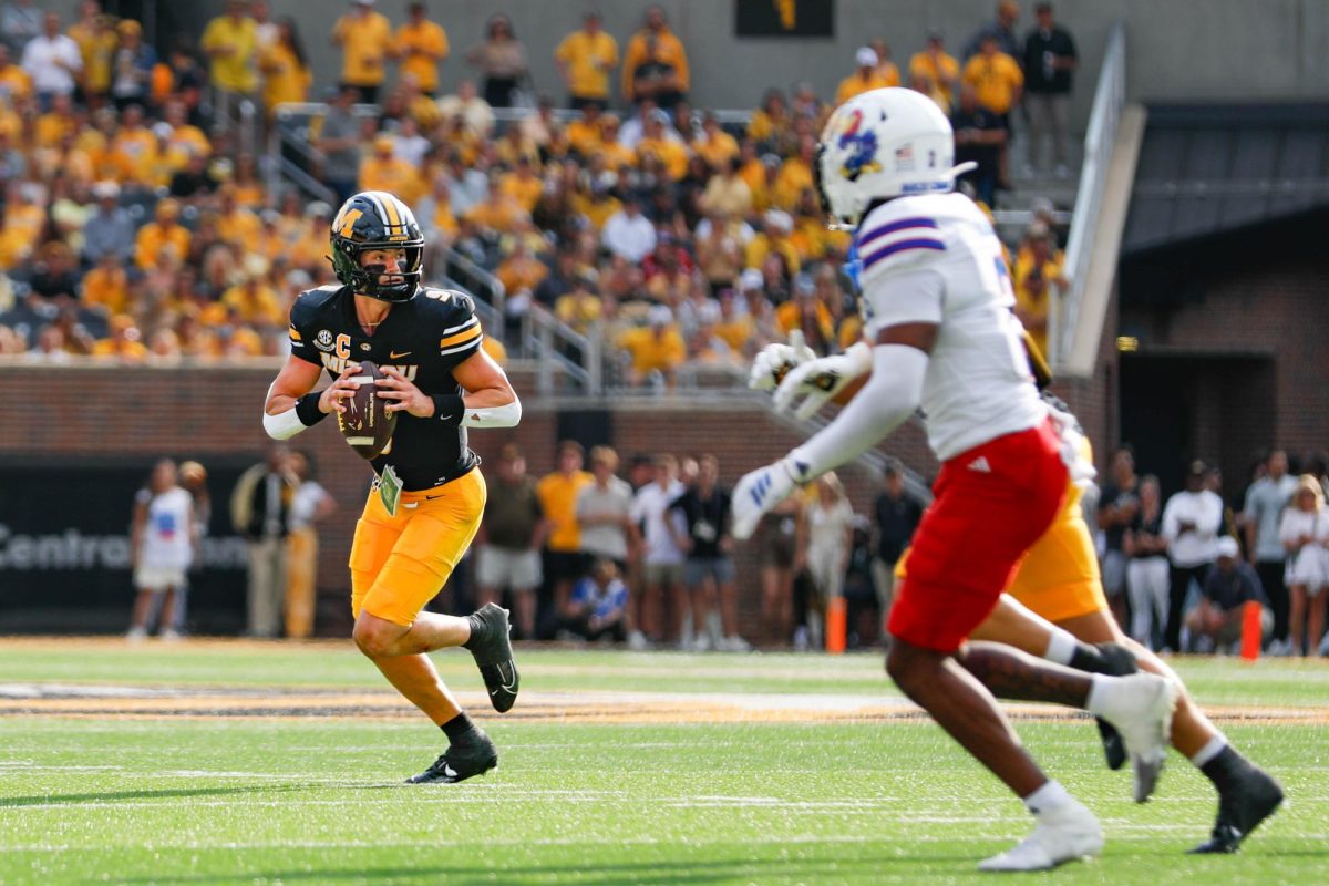 Missouri Quarterback Beau Pribula searches for a player to pass to during
Missouri’s game against Kansas on Saturday, September 6, 2025 at Faurot Field in Columbia, Mo. Pribula had three passing touchdowns in the game for the Tigers.