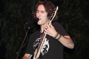Find Fiona guitarist Luke Sabath delivers a passionate vocal performance during the group's set on Saturday, Aug. 30, 2025, at Rose Park in Columbia, Mo. Sabath says he hopes to become more involved in the band’s vocal side over the next few months.