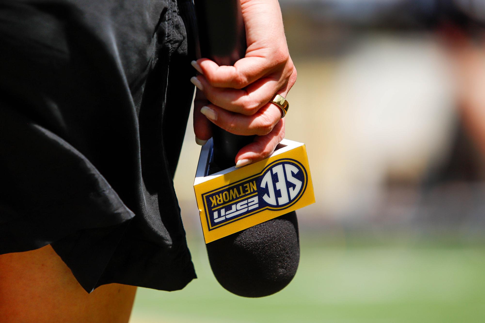 An ESPN SEC network microphone is held during the football game against  Louisiana-Lafayette on Saturday, Sept. 13, at Faurot Field in Columbia, Mo. Missouri has been a part of the SEC for 13 years.