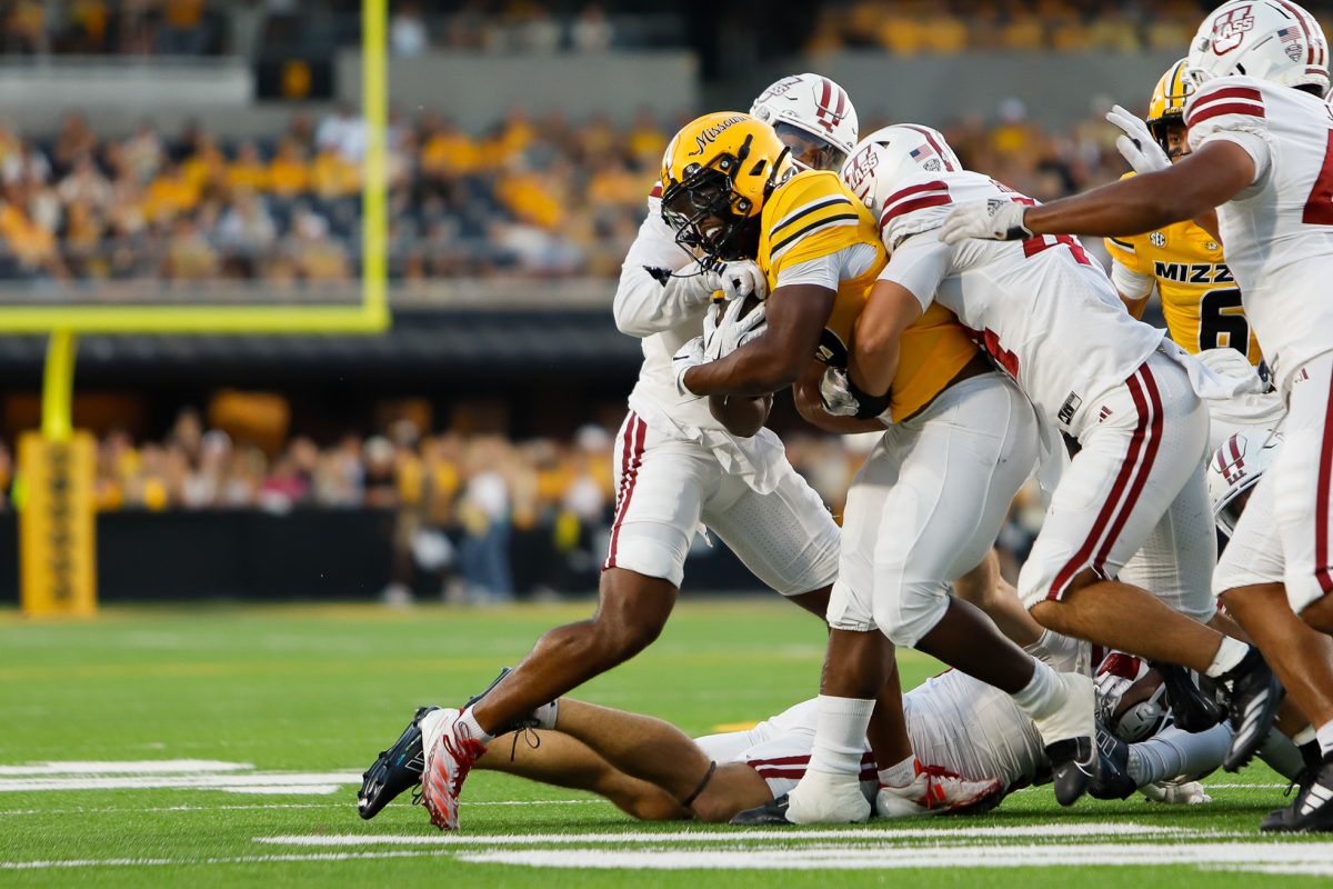 Missouri running back Ahmad Hardy pushes through a cluster of Massachusetts players in a touchdown attempt during Missouri’s game versus Massachusetts on Saturday, Sept. 27, 2025 at Farout Field in Columbia, Mo. The Tigers’ next home game will be against Alabama on Saturday, Oct. 11, 2025, at 11 a.m. 