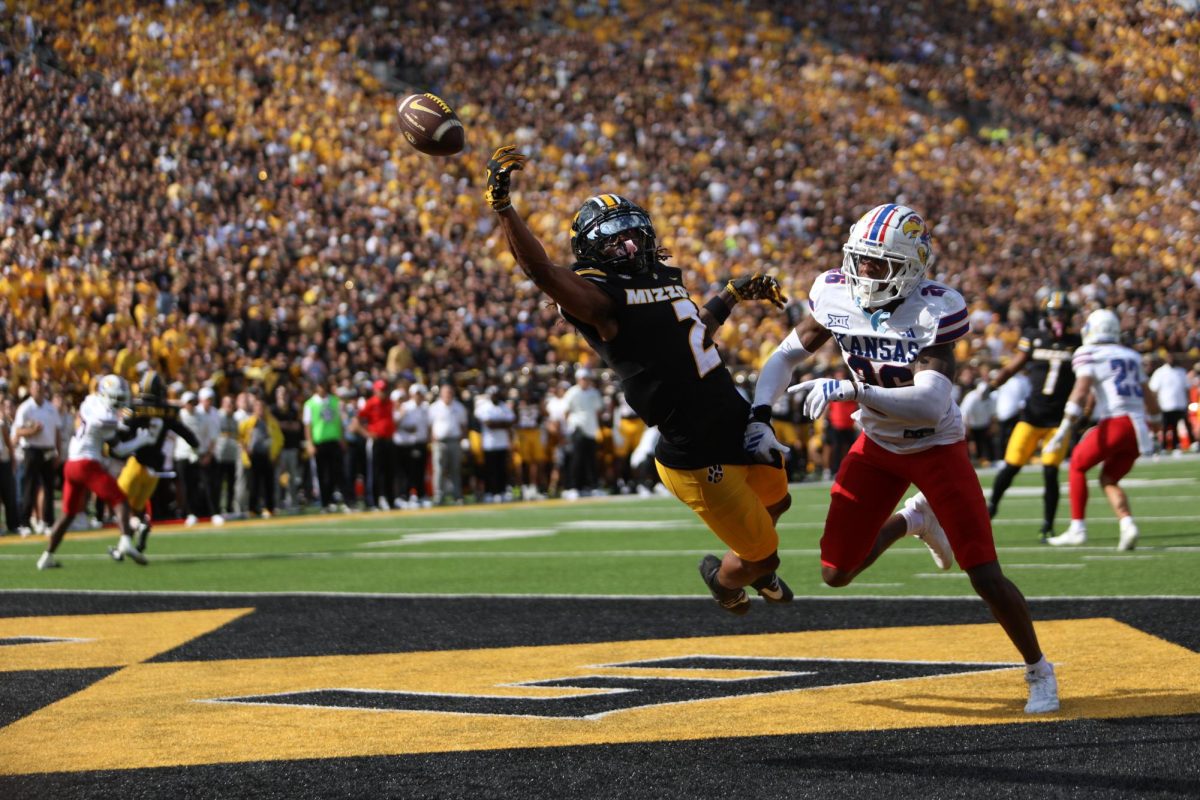Missouri wide receiver Marquis Johnson jumps for the football against Kansas on Saturday, Sept. 6, 2025, at Faurot Field in Columbia, Mo. The two teams have not gone head to head in football since 2011, when the Tigers won 24-10.