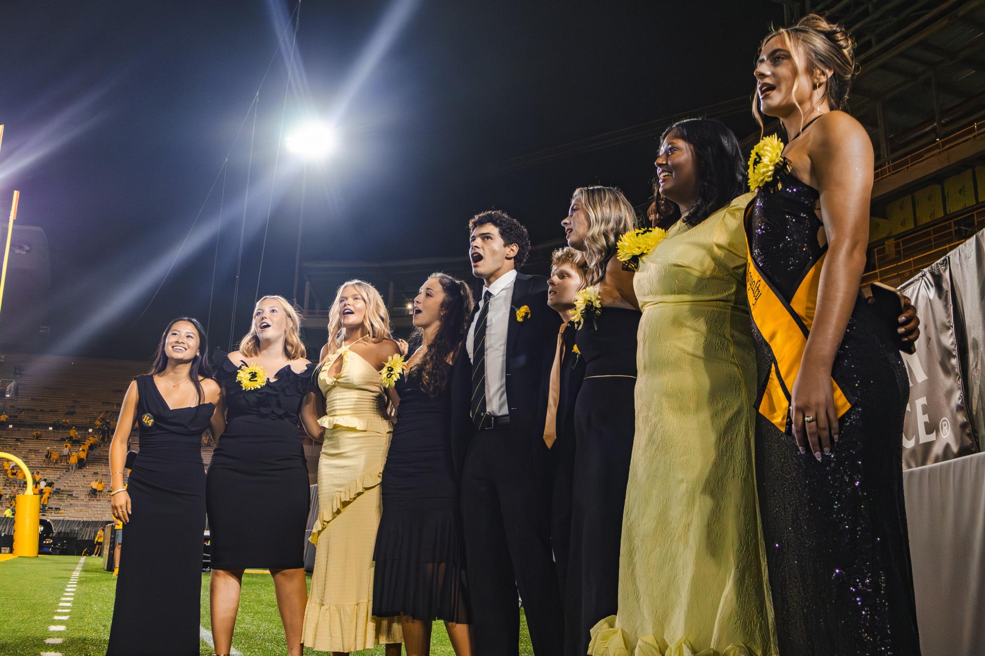 Missouri Homecoming Steering Committee and Homecoming Royalty Top 10 members sing along to “Old Missouri” after the football game against Massachusetts on Saturday, Sept. 27, at Faurot Field in Columbia, Mo. The Missouri Homecoming Steering Committee is made up of 38 student leaders who organize the homecoming events leading up to the football game.