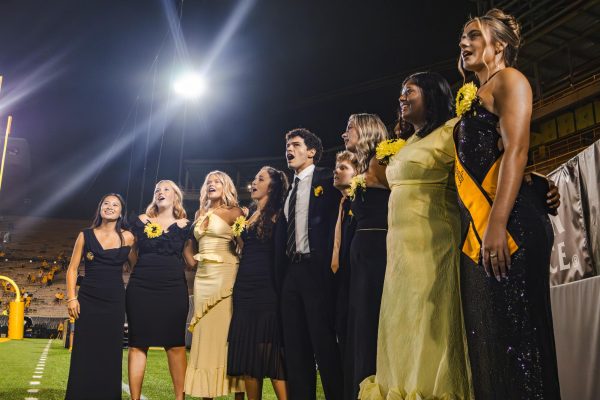 A group of people sing together