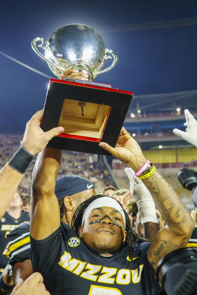Missouri wide receiver Marquis Johnson hoists the Mayor’s Cup after defeating South Carolina 29-20 on Sept. 20, at Faurot Field in Columbia, Mo. The Mayor’s Cup tradition began as an idea from the mayor of Columbia, SC, as they share a name with Columbia, MO. 