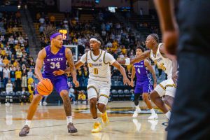 Missouri guard Anthony Robinson II goes for the ball during a game against Kansas State on Friday, Oct. 24 at Mizzou Arena in Columbia, Mo. Robinson scored 16 points for the Tigers throughout the game. 
