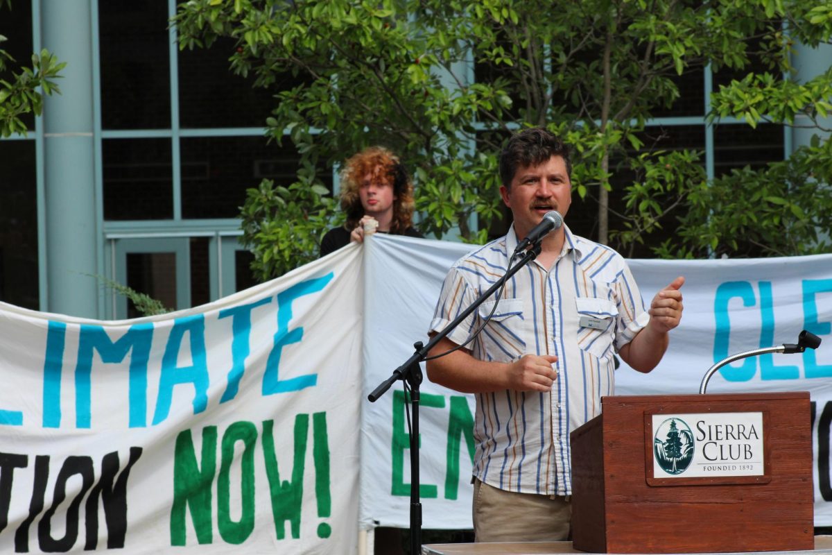  Josh Parshall speaks about public transportation and building viable alternatives to driving on Sunday, Sept. 21, at Boone County Courthouse Plaza in Columbia, Mo. Parshall is the chief development officer at Local Motion, a Columbia-based transit advocacy non-profit. 