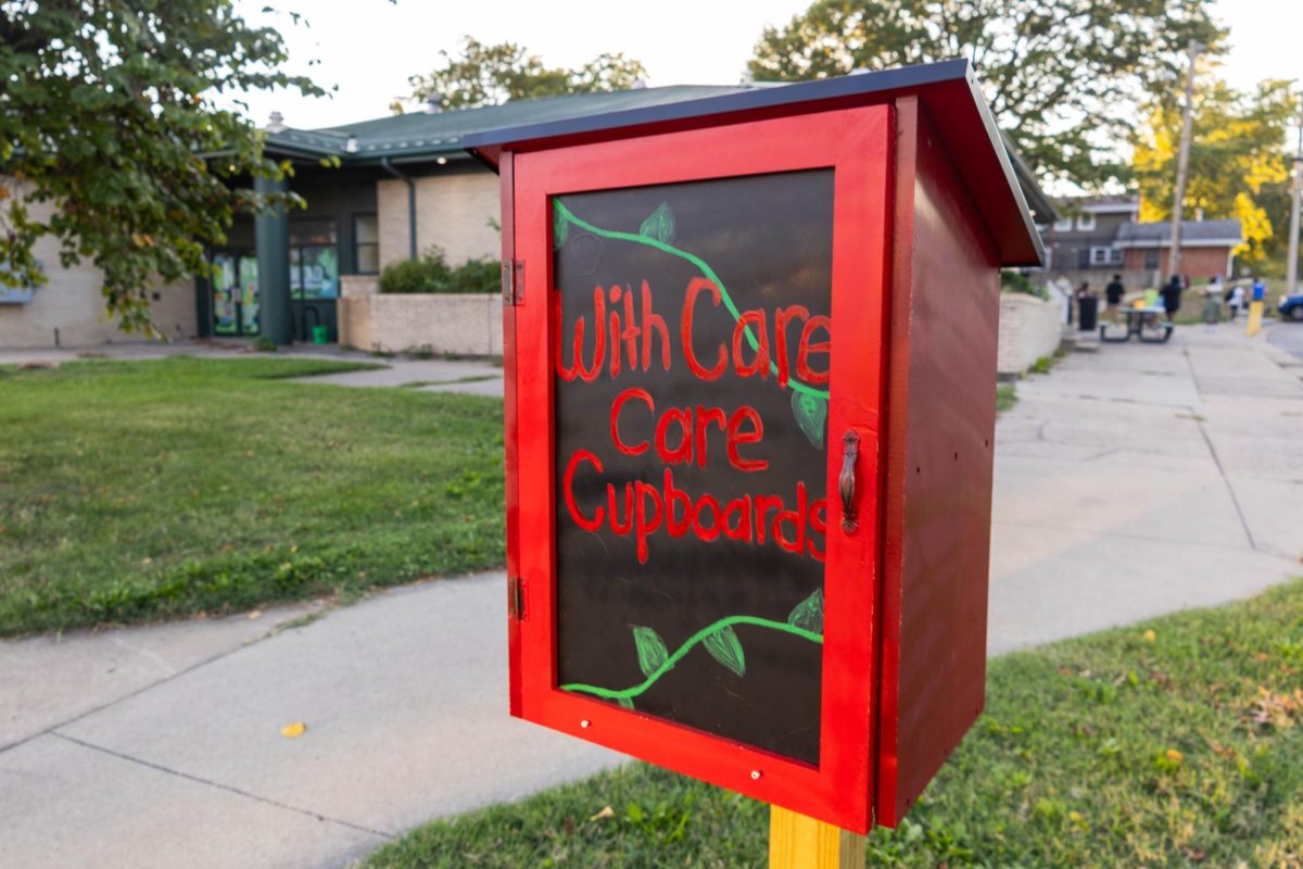 A care cupboard sits outside of the Moving Ahead Program on Thursday, Oct. 16, in Columbia, Mo. These care cupboards are designed to help fight against period poverty and provide feminine hygiene products to nearby residents.