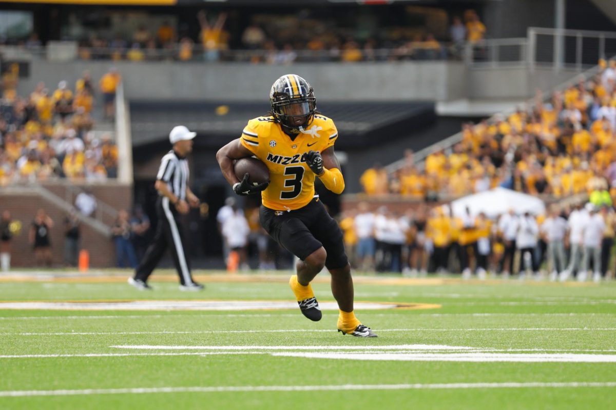 Missouri wide receiver Luther Burden III  rushes down the field with a football in the game against Boston College on Saturday, Sept. 14, 2024.