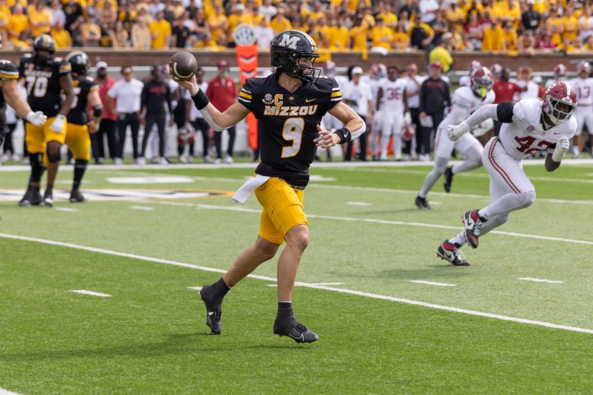 Missouri quarterback Beau Pribula rolls out of the pocket winding up his arm for a pass while facing Alabama on Saturday, Oct. 11 in Columbia, Mo. Pribula passed for 167 yards and two touchdowns throughout four quarters of play.