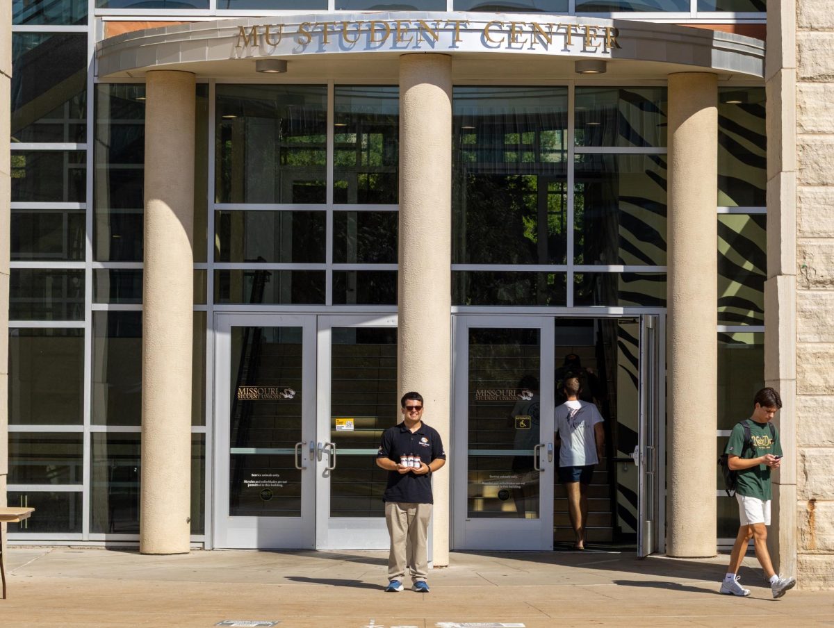 Andrew Rubin, first-year student and CEO of State Street Spices stands outside of the MU Student Center holding his product. State Street Spices is a business he founded when he was 16 and currently sells out of his eCommerce store and office in the Innovators Nexus. 