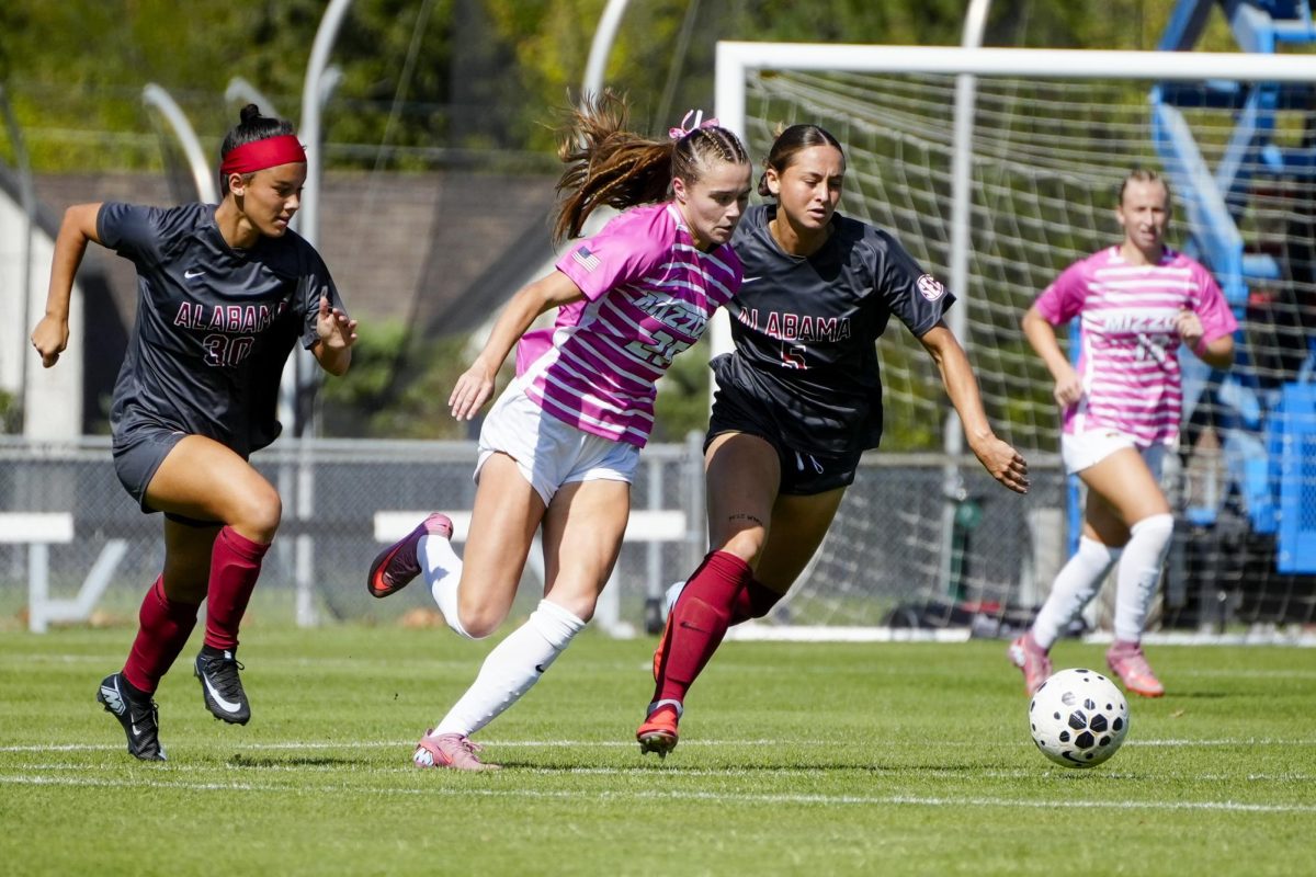 Missouri midfielder Landis Canada chases a ball with Alabama midfielders
Paige Thompson and Isabel Smith during a match on Sunday, Oct. 5 at Audrey J. Walton Soccer Stadium in Columbia, Mo. Missouri fell 3-0 to Alabama. 