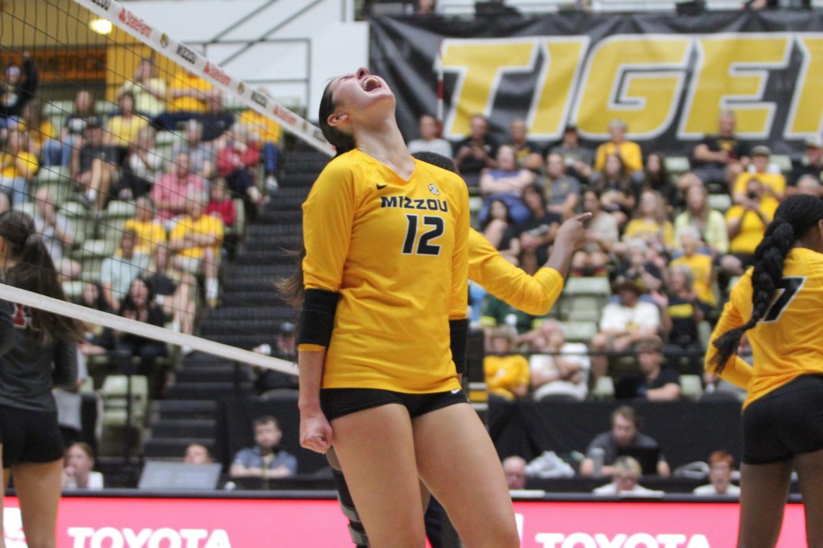 Missouri outside hitter Janet deMarrais celebrates after winning a rally against Oklahoma on Sunday Oct. 5, at the Hearnes Center in Columbia, Mo. deMarrais had 11 kills against Oklahoma.