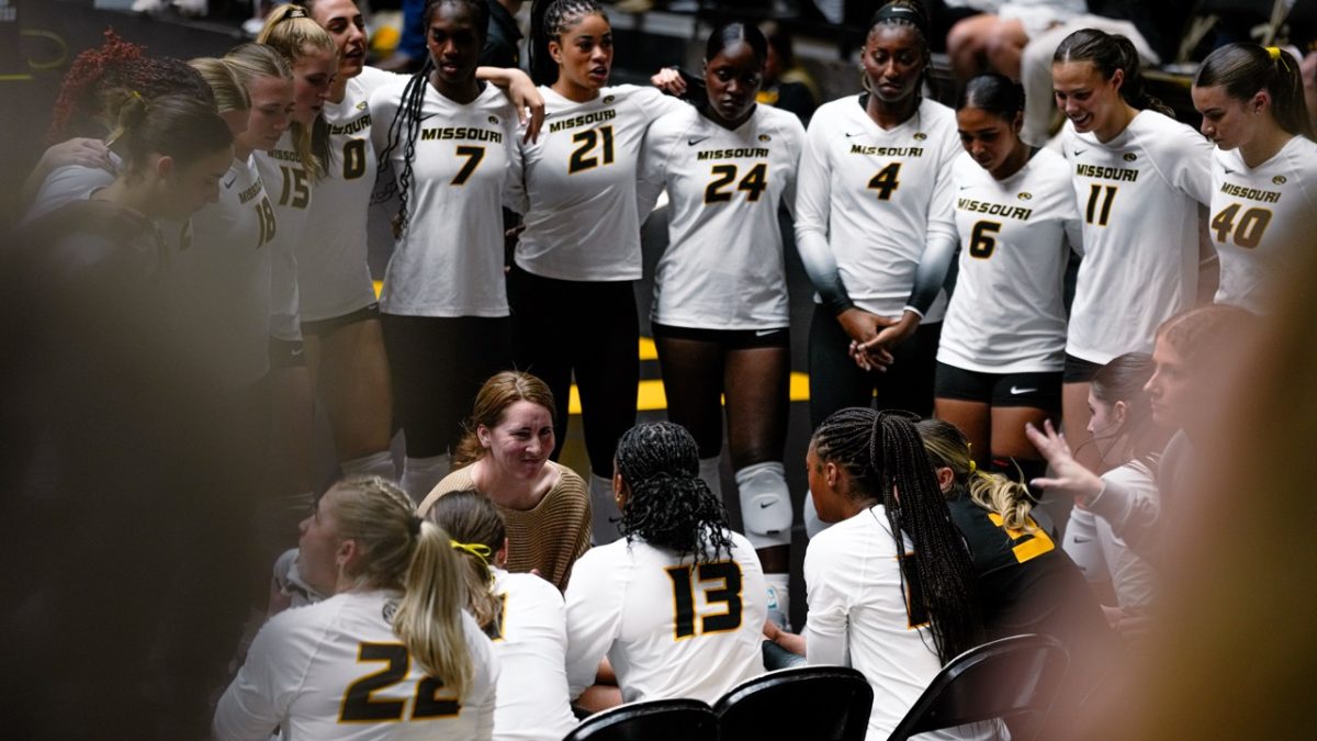 Missouri volleyball coach Dawn Sullivan huddles up during a timeout on Thursday, Nov. 6 at Hearnes Center in Columbia Mo. Missouri would lose 3-1 against the number 2 ranked Kentucky.