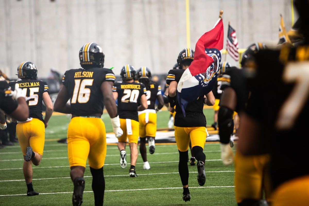 Missouri football players run out of the tunnel before their game against
Alabama on Saturday, Oct. 11 at Farout Field in Columbia, Mo. 