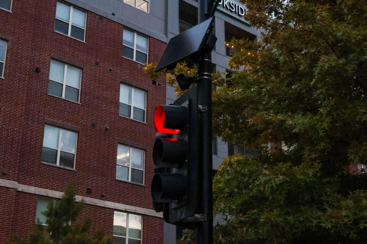 A Flock Safety camera sits on the corner of S. Ninth St. and Elm St. on Wednesday, Oct. 29, in Columbia, Mo. These cameras have automated license plate readers and fixed cameras.