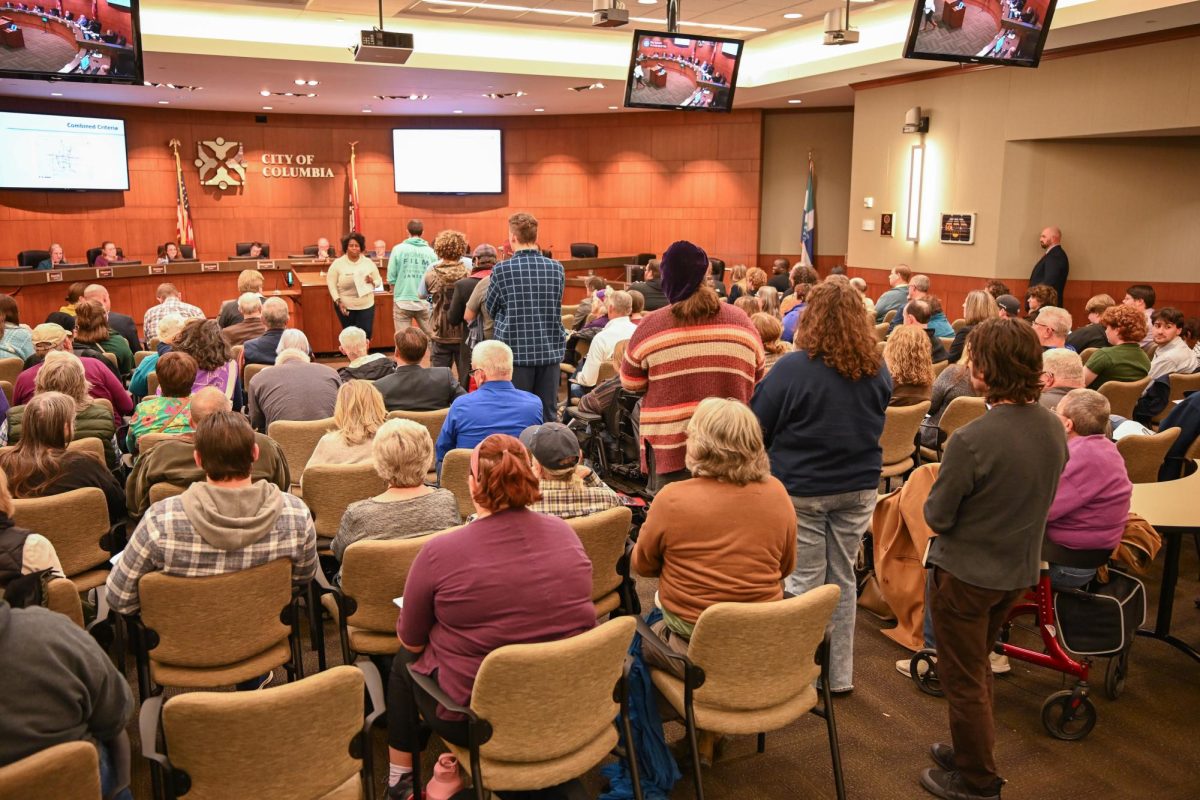 Members of the public line up to speak to city council members regarding an ordinance to limit pedestrian access to medians on Monday, Nov. 17 in Columbia, Mo. The provisions drew public criticism with several claiming it was an attempt to criminalize panhandling. 