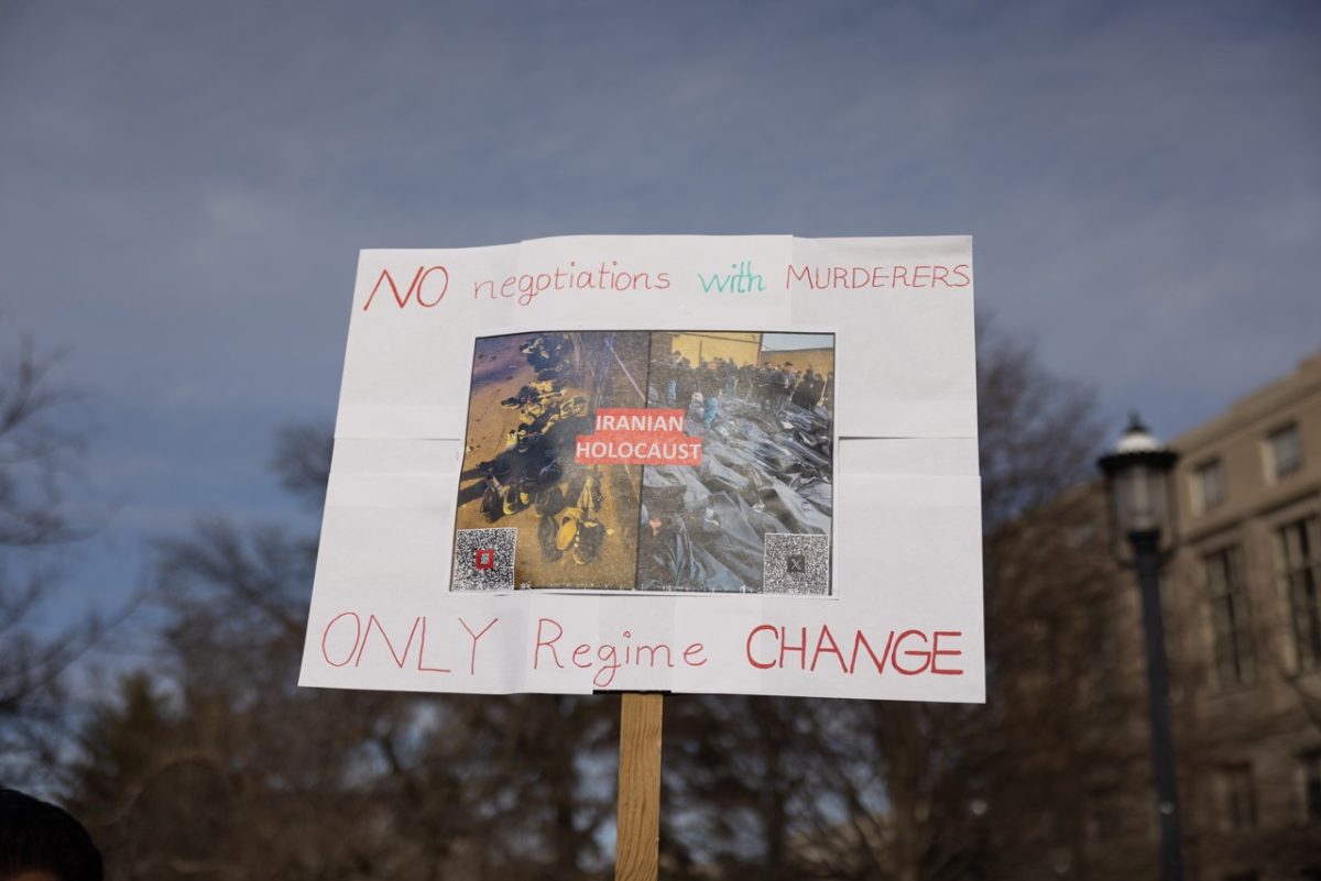 Protester holds up a sign